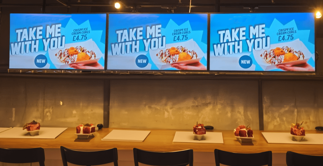 Multiple promotional screens in a restaurant