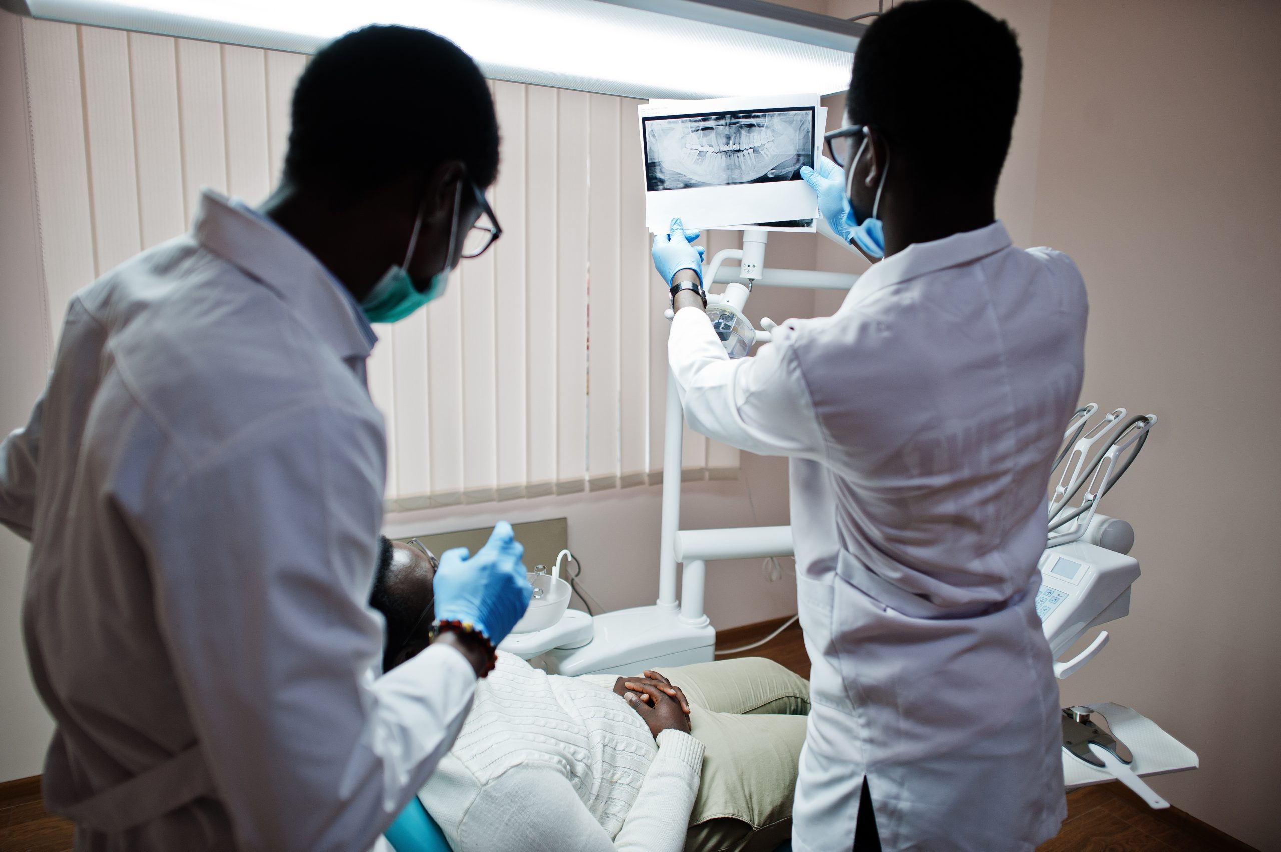 African,American,Man,Patient,In,Dental,Chair.,Dentist,Office,And